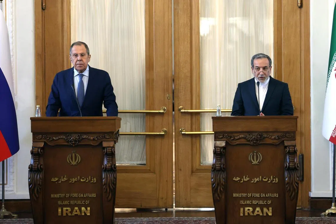 Russian Foreign Minister Sergey Lavrov (left) attending a joint press conference with his Iranian counterpart, Mr Abbas Araghchi, in Tehran, on Feb 25.