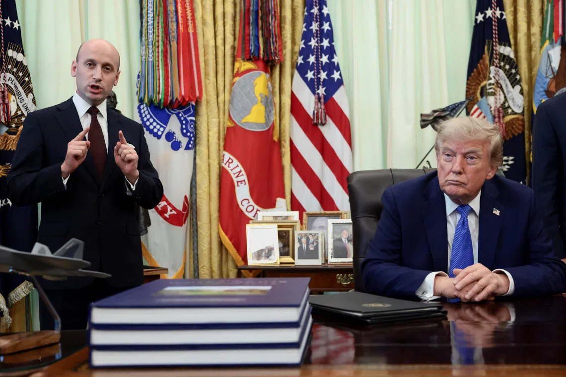 White House Deputy Chief of Staff Stephen Miller speaks while U.S. President Donald Trump listens during an event to sign executive orders related to birthright citizenship and the polysilicon industry, in the Oval Office at the White House in Washington, D.C., U.S., August 6, 2026. REUTERS/Evelyn Hockstein