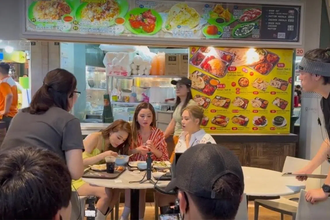 (From left) Joey Yung, Charlene Choi and Gillian Chung at Lau Pa Sat in a video shared on Xiaohongshu on March 17.