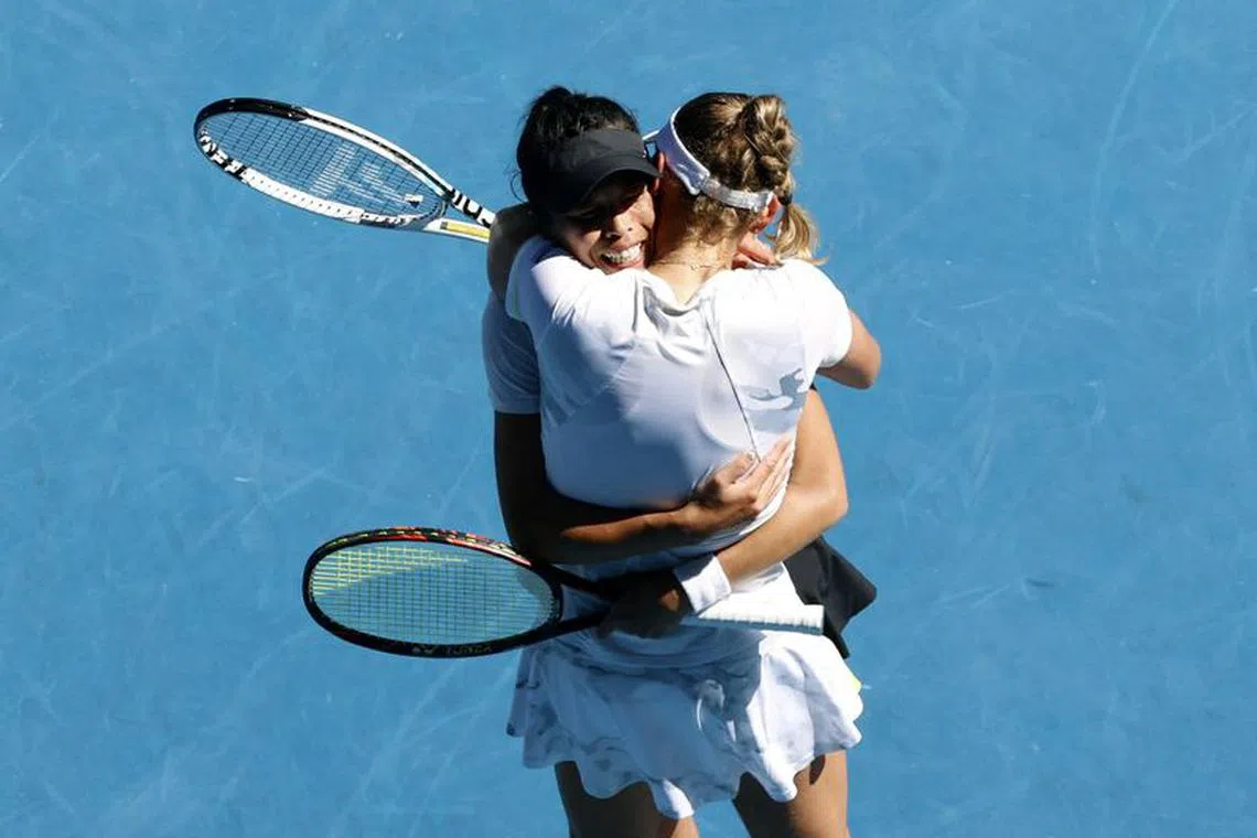 Tennis - Australian Open - Melbourne Park, Melbourne, Australia - January 28, 2024 Taiwan's Hsieh Su-wei and Belgium's Elise Mertens celebrate after winning their women's doubles final match against Latvia's Jelena Ostapenko and Ukraine's Lyudmyla Kichenok REUTERS/Ciro De Luca