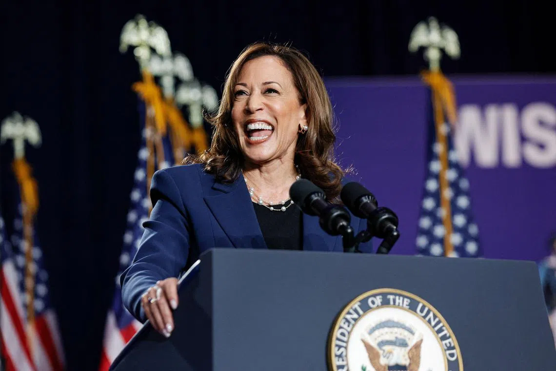 TOPSHOT - US Vice President and Democratic Presidential candidate Kamala Harris speaks at West Allis Central High School during her first campaign rally in Milwaukee, Wisconsin, on July 23, 2024. Harris is in Wisconsin to start her presidential campaign after effectively clinching the Democratic presidential nomination. (Photo by KAMIL KRZACZYNSKI / AFP)

