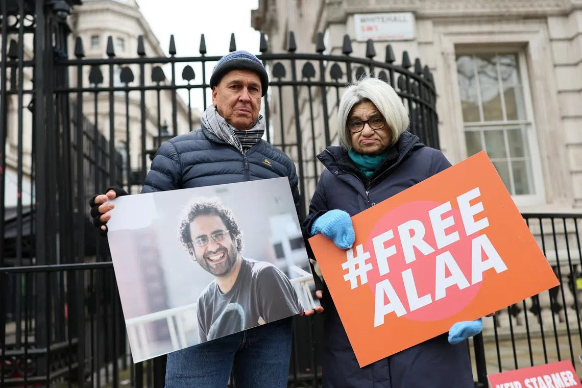 Australian journalist Peter Greste, arrested and imprisoned in Egypt in 2013 while reporting for Al Jazeera, stands with Laila Soueif, mother of jailed Egyptian-British activist Alaa Abd el-Fattah, as he joins her on hunger strike to protest against el-Fattah's detention in Egypt, outside Downing Street in London, Britain, January 20, 2025. REUTERS/Isabel Infantes