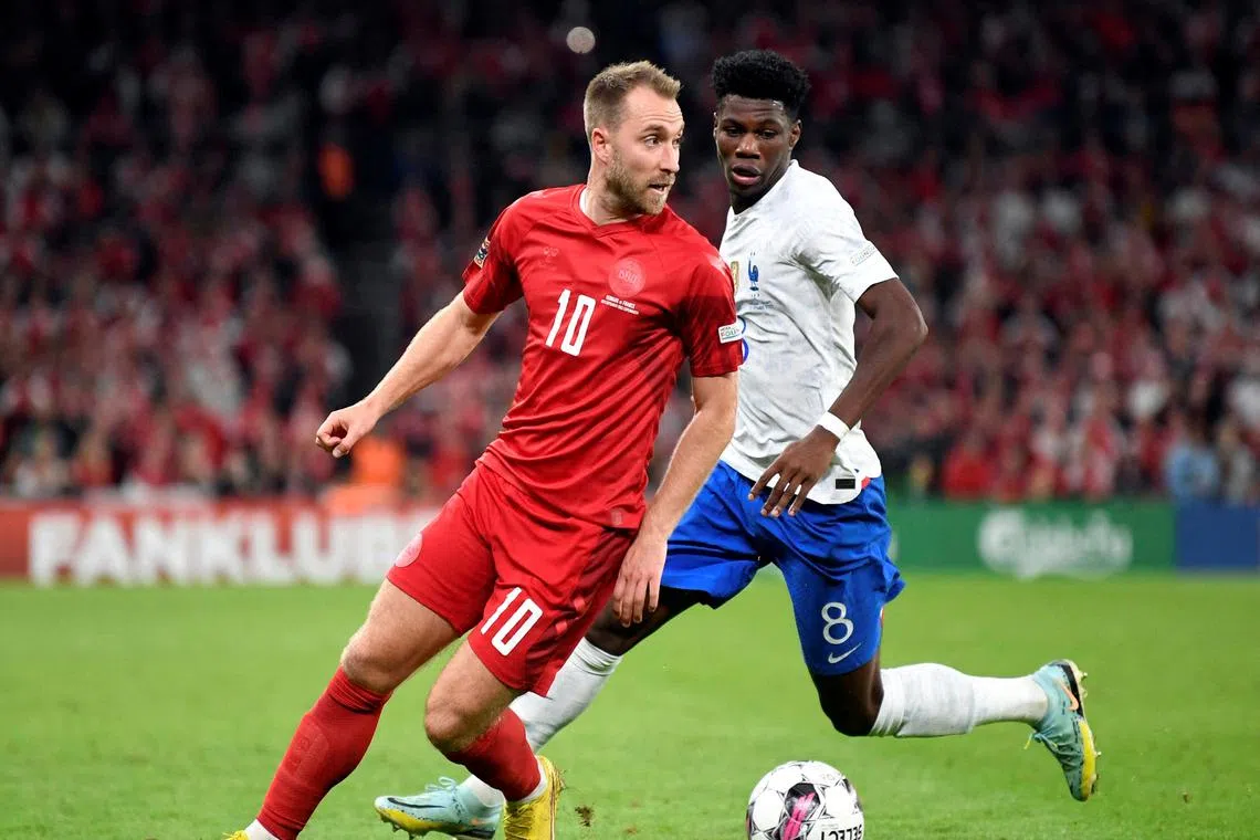 Denmark's Christian Eriksen (left) in action against France's Aurelien Tchouameni during the Danes' 2-0 Nations League win in September. Eriksen, who suffered a cardiac arrest during Euro 2020, was one of 21 players named by Kasper Hjulmand on Monday in Denmark’s World Cup squad