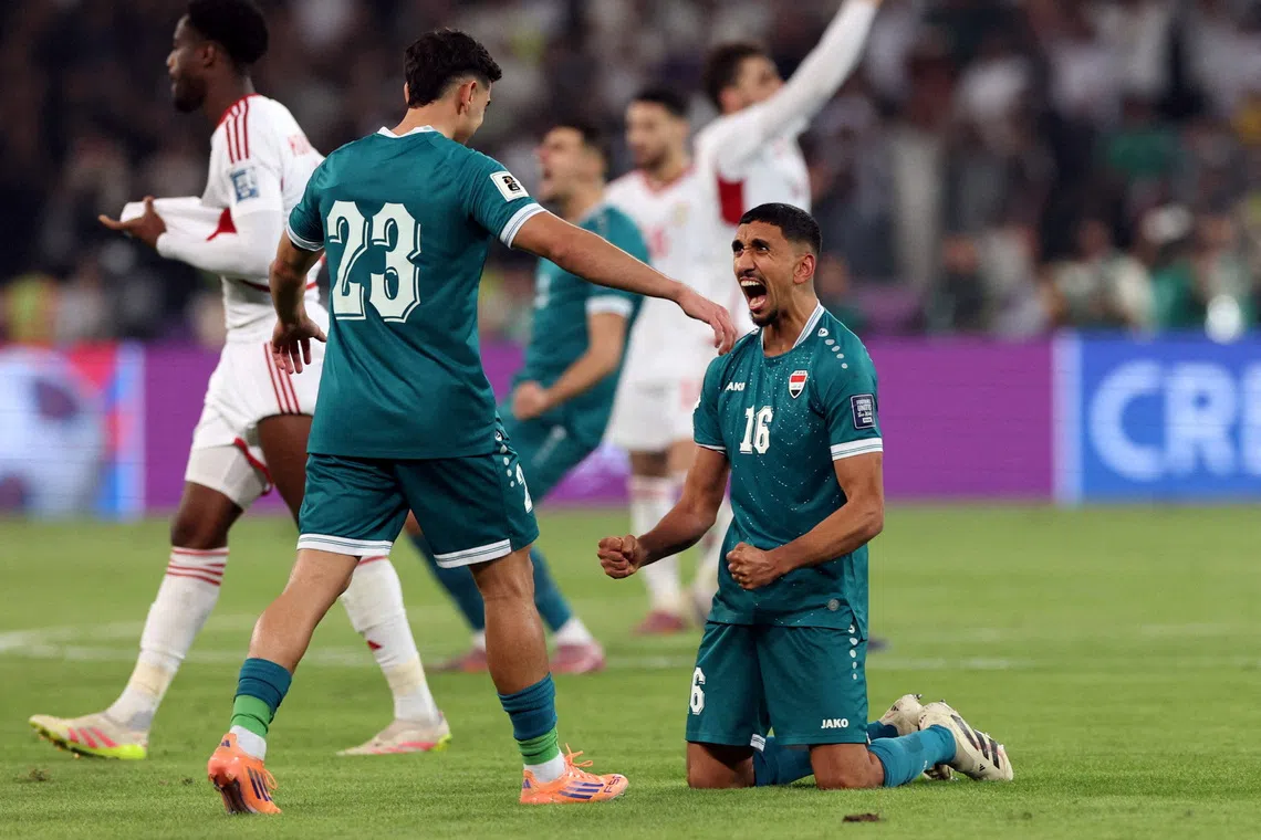 Soccer Football - FIFA World Cup - AFC Qualifiers - Play Off - Second Leg - Iraq v United Arab Emirates - Basra International Stadium, Basra, Iraq - November 18, 2025 Iraq's Amir Al-Ammari and Merchas Doski celebrate after the match REUTERS/Thaier Al-Sudani