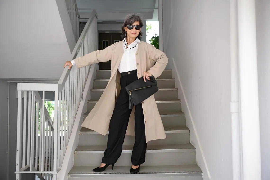 Ms Vicsland Poh in a layered neutral-toned outfit inspired by Meryl Streep’s Miranda Priestly character in The Devil Wears Prada.