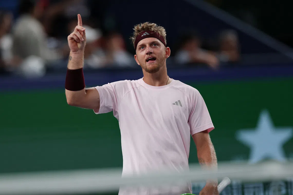 Alejandro Davidovich Fokina celebrates after beating German Alexander Zverev in Shanghai.