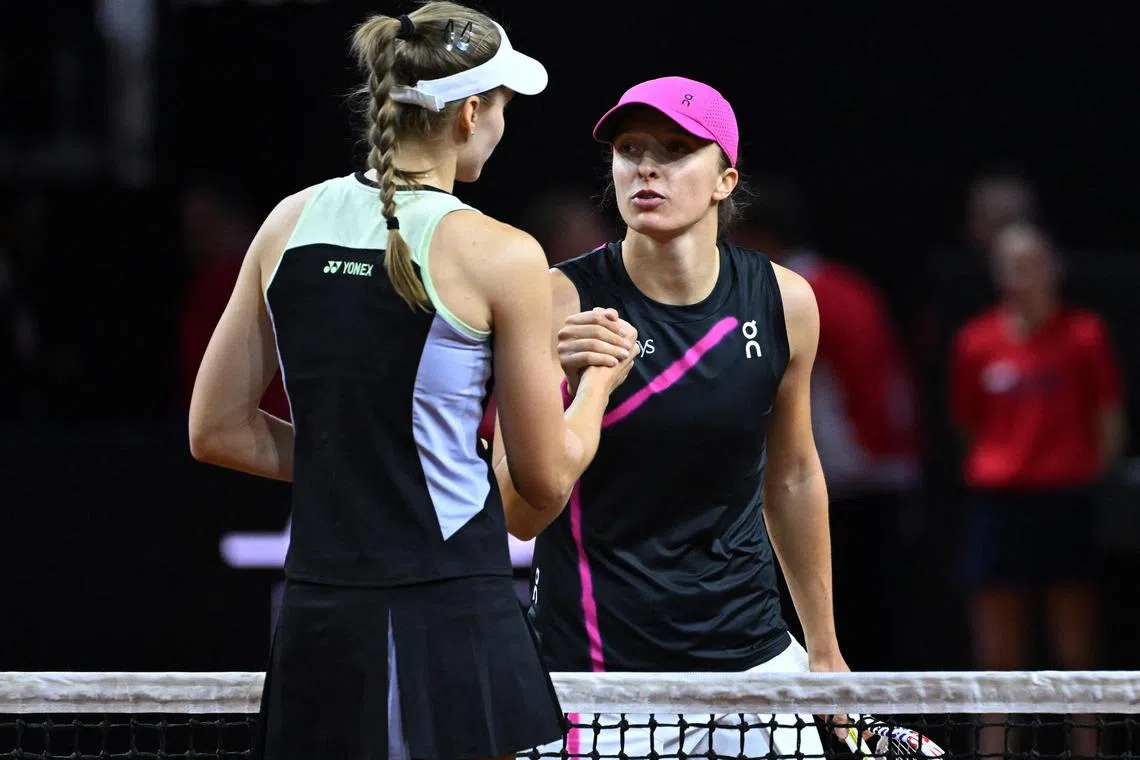 Poland's Iga Swiatek (right) congratulates Kazakhstan's Elena Rybakina, after their semi-final match.