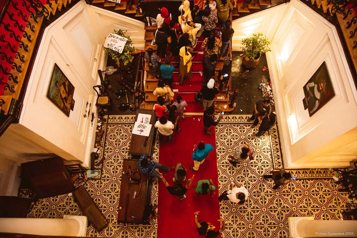 Sri Lankan protestors taking over the Presidential palace after President Gotabaya Rajapaksa fled the country.