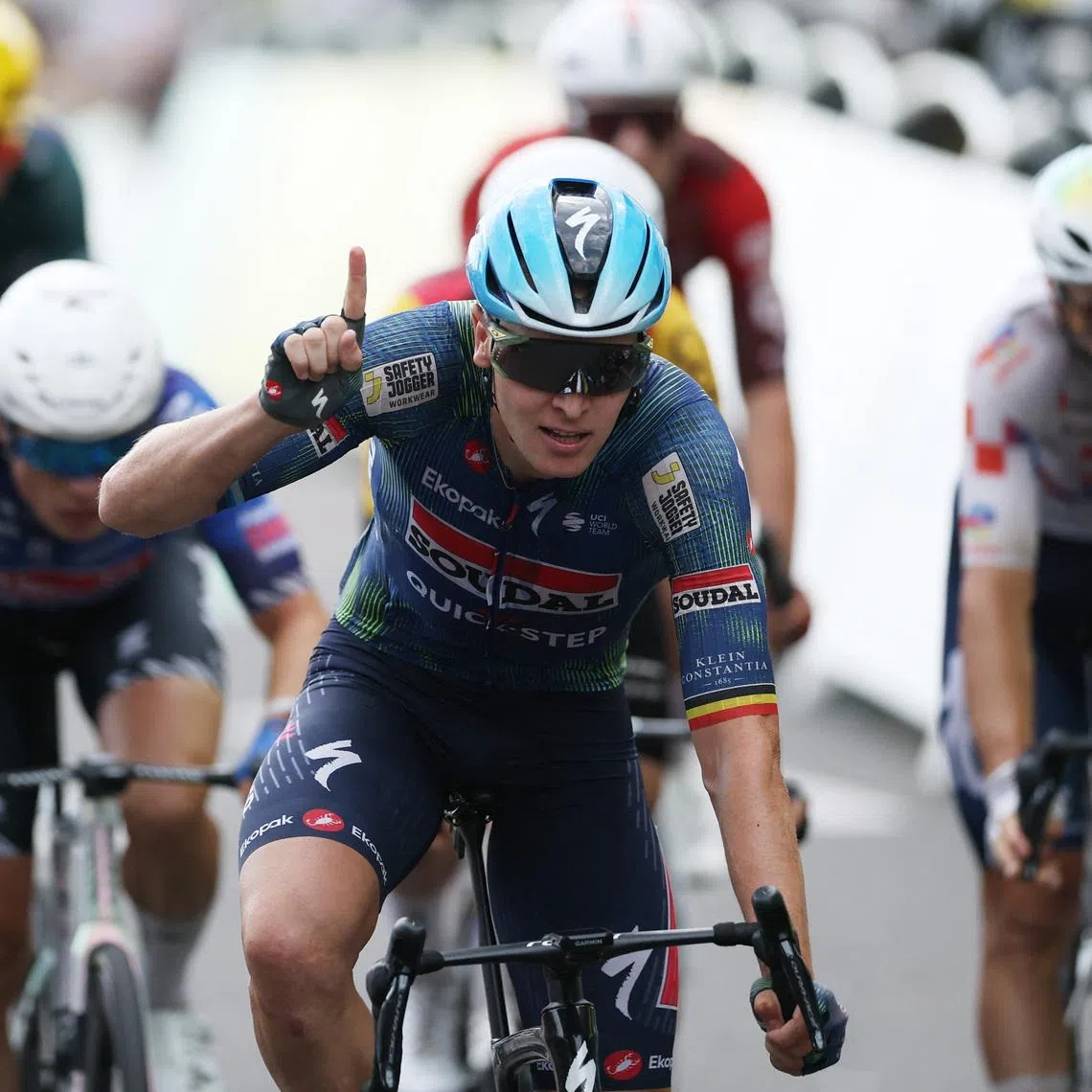 Soudal-Quick Step’s Tim Merlier celebrates winning Stage 12.