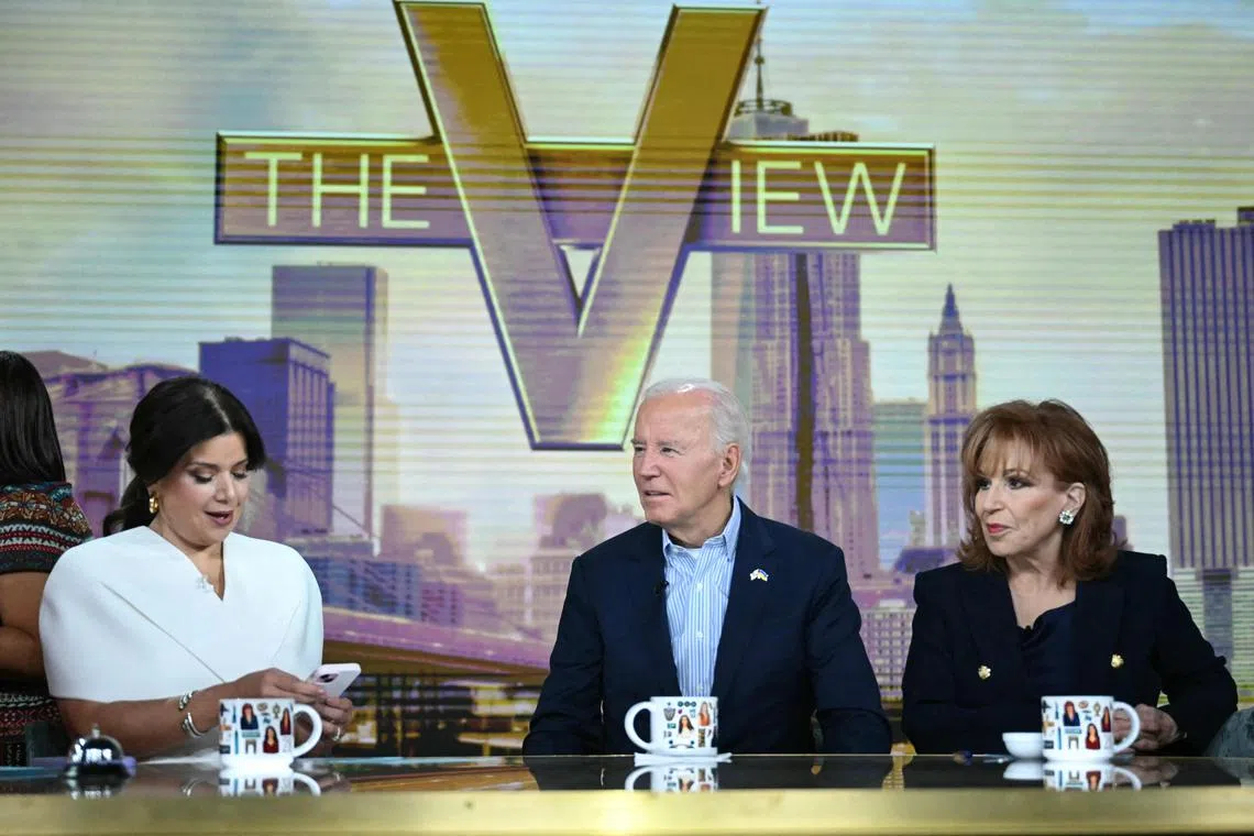 US President Joe Biden (centre) speaking with hosts Ana Navarro (left) and Joy Behar during his appearance on ABC's The View, on Sept 25.