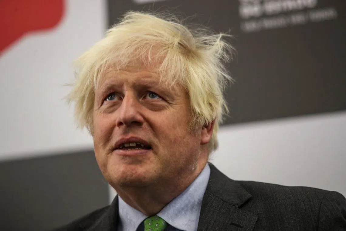 FILE PHOTO: United Kingdom's former Prime Minister Boris Johnson reacts after a meeting with Sao Paulo's Governor Tarcisio de Freitas (not pictured), in Sao Paulo, Brazil, August 31, 2023. REUTERS/Carla Carniel/File Photo