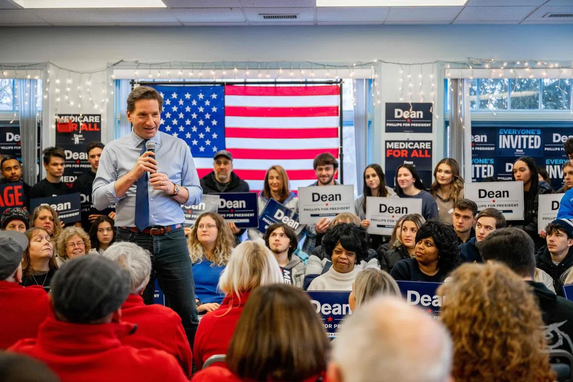 Democratic challenger Dean Phillips  speaks to supporters during a campaign rally in Nashua, New Hampshire.