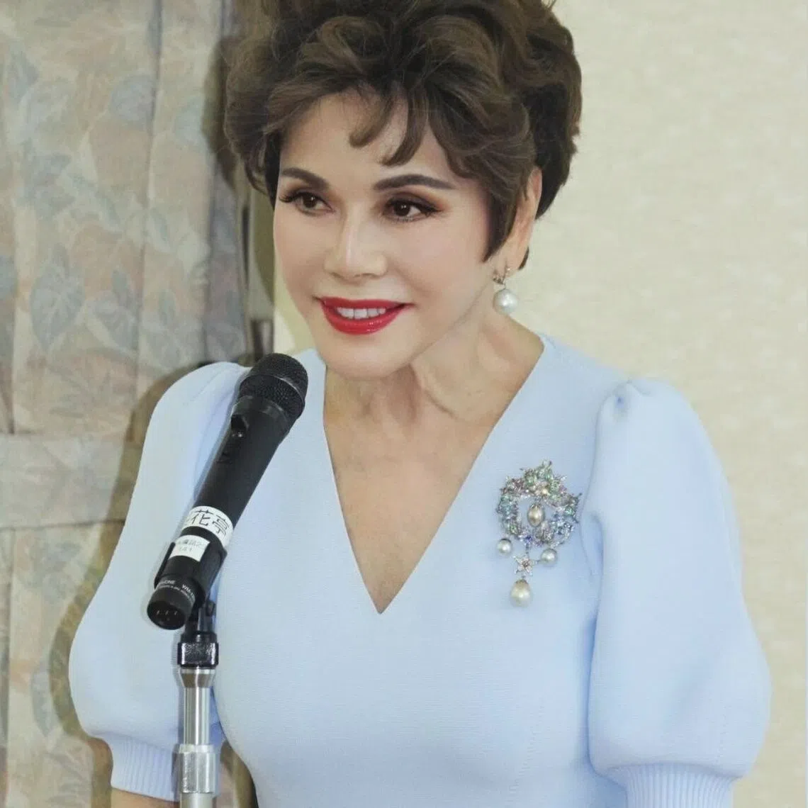 Dewi Sukarno allegedly threw a champagne glass at her then assistant and attacked her then manager by punching and kicking her.