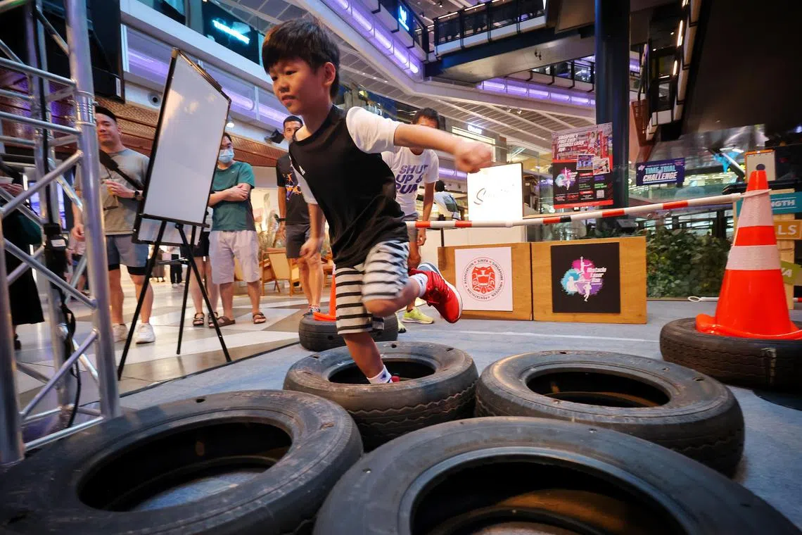 ST20240518_202407527031/dgsport18/Deepan/Jason Quah

Marcellino Choo, eight, tries out an obstacle course at a preview of the upcoming Urban Sports & Fitness Festival (USFF), in Funan Mall on May 18, 2024.