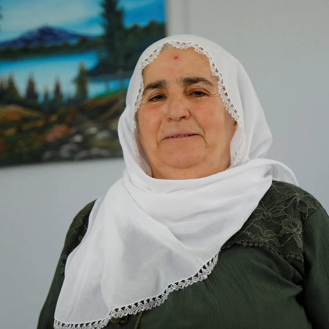Hatice Yasar, a member of the \"Peace Mothers\" who says her two sons joined the outlawed Kurdistan Workers Party (PKK) and never returned, poses for a photograph during an interview with Reuters in Diyarbakir, Turkey, August 11, 2026. REUTERS/Sertac Kayar