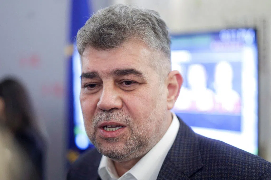 FILE PHOTO: Romanian Prime Minister and presidential candidate Marcel Ciolacu talks with media representatives after the announcement of the first exit polls during the first round of the presidential election in Bucharest, Romania, November 24, 2024. Inquam Photos/Octav Ganea via REUTERS