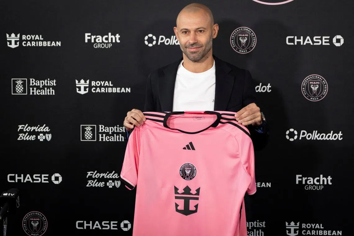 Newly appointed Inter Miami head coach Javier Mascherano poses for photos during a press conference, at Chase Stadium in Fort Lauderdale, Florida, U.S., December 3, 2024. REUTERS/Marco Bello