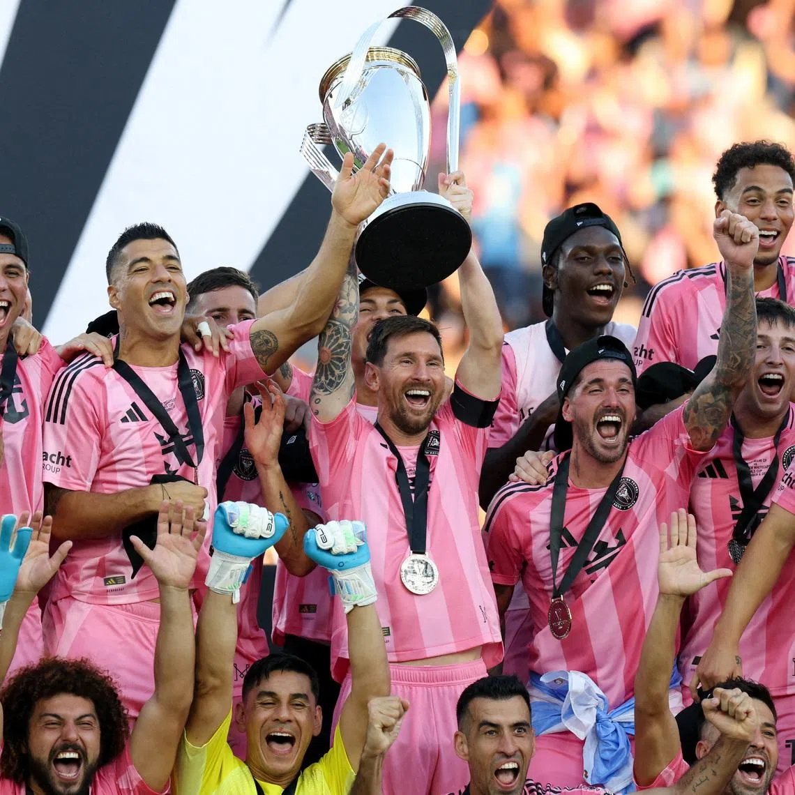 Dec 6, 2025; Fort Lauderdale, Florida, USA; Inter Miami forward Lionel Messi (10) lifts the Philip F. Anschutz trophy after winning the 2025 MLS Cup against the Vancouver Whitecaps FC at Chase Stadium. Mandatory Credit: Nathan Ray Seebeck-Imagn Images/File Photo
