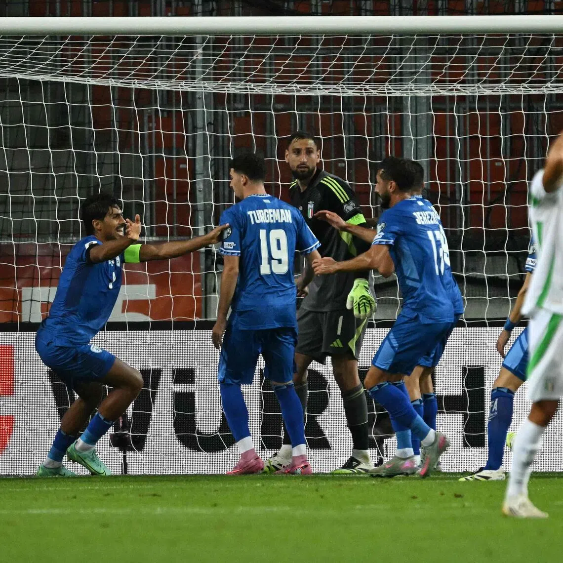 Israel players celebrating a goal during their 5-4 World Cup qualifying defeat by Italy on Sept 8.