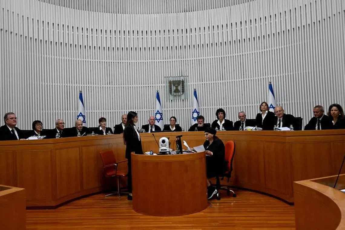 President of the Supreme Court of Israel Esther Hayut and all fifteen justices assemble to hear petitions against the reasonableness standard law in the High Court in Jerusalem, on Tuesday, September 12, 2023.    DEBBIE HILL/Pool via REUTERS/File Photo
