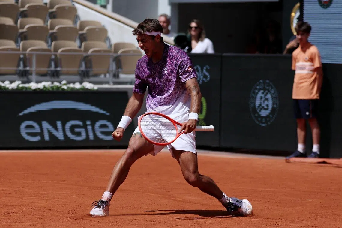 Italy's Flavio Cobolli celebrating after winning his French Open fourth-round match against Zachary Svajda of the US  6-2, 6-3, 6-7 (3-7), 7-6 (7-5) at Roland Garros on June 1, 2026.
