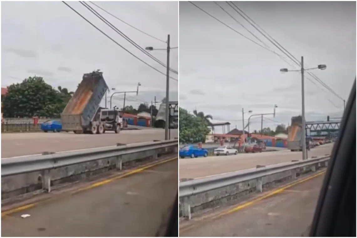 The truck hit an electric cable along Jalan Johor Bahru-Gelang Patah-Pendas, causing three nearby concrete lamp posts to collapse.
