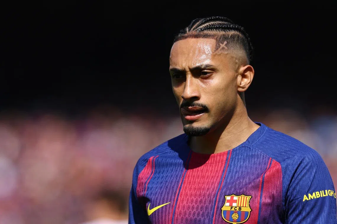 Soccer Football - LaLiga - FC Barcelona v Rayo Vallecano - Spotify Camp Nou, Barcelona, Spain - March 22, 2026 FC Barcelona's Raphinha reacts REUTERS/Albert Gea
