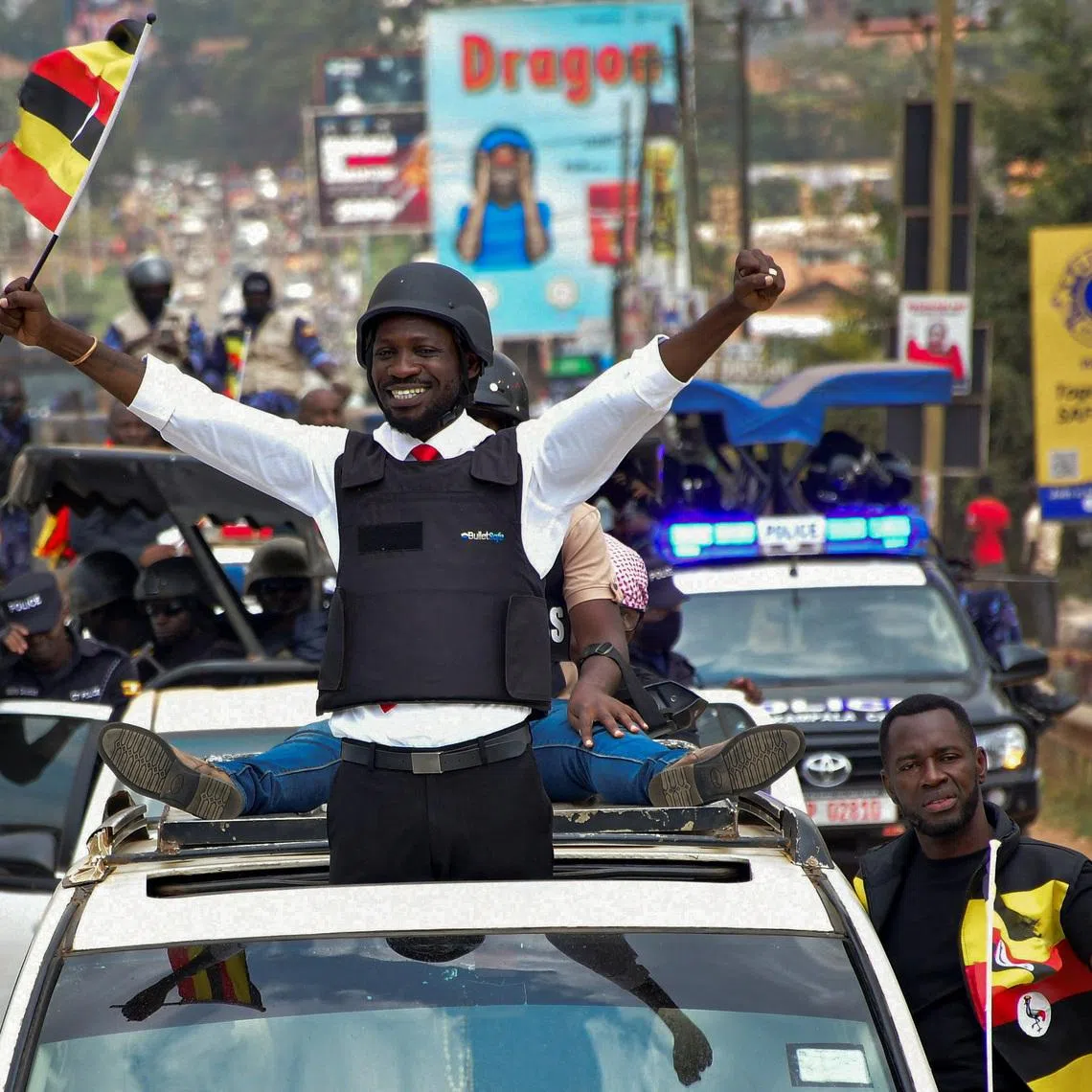 Ugandan presidential candidate Robert Kyagulanyi, also known as Bobi Wine, of the National Unity Platform (NUP), rides on a motorcade as he campaigns ahead of the general elections, in Kampala, Uganda, January 12, 2026. REUTERS/Abubaker Lubowa