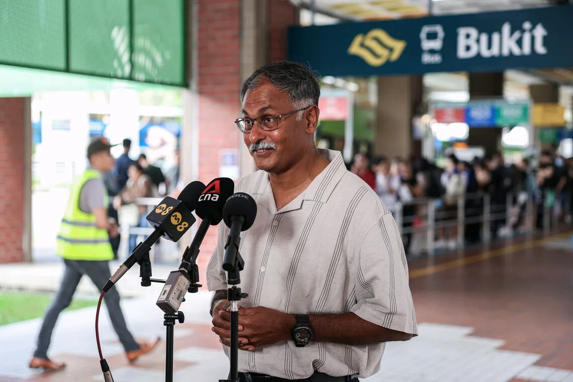 Senior Minister of State for Transport Murali Pillai giving a soundbite during his visit to Bukit Batok Bus Interchange on Aug 18.