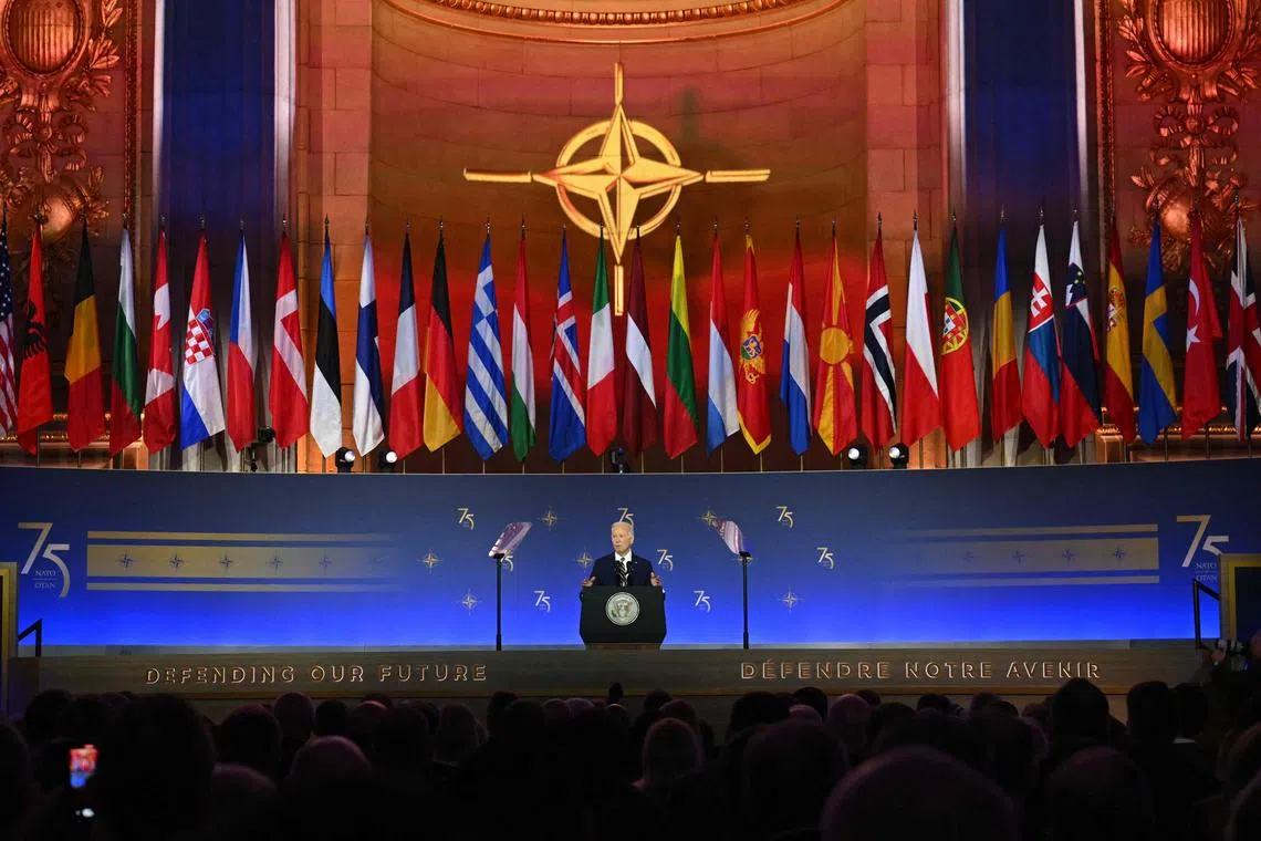 US President Joe Biden speaks during the Nato 75th Anniversary Celebratory Event at the Mellon Auditorium in Washington, DC.