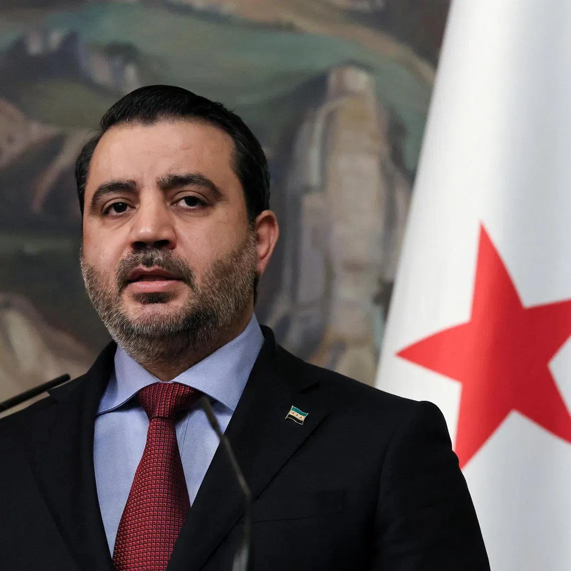 FILE PHOTO: Syrian Foreign Minister Asaad Hassan al-Shibani speaks during a press conference in Moscow, Russia, July 31, 2025. REUTERS/Shamil Zhumatov/Pool/File Photo