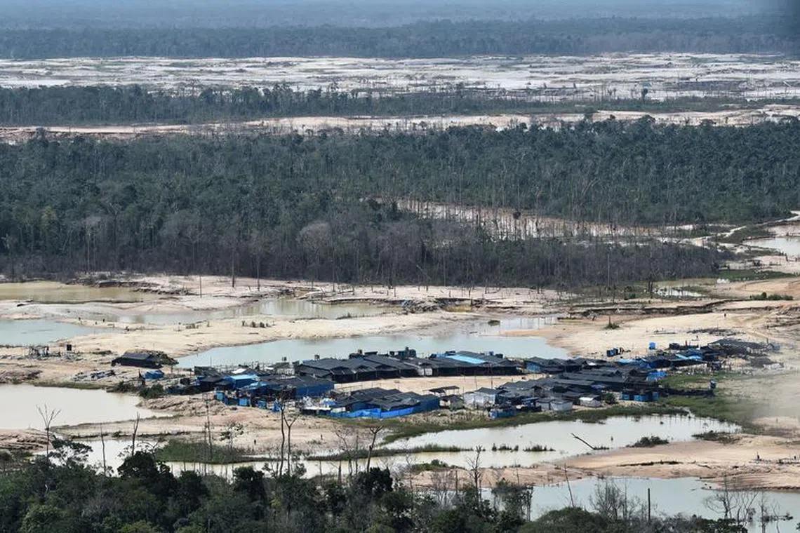 FILE PHOTO: A view shows an illegal gold mining camp during a police operation to destroy illegal machinery and equipment used by wildcat miners in Madre de Dios, Peru, February 19, 2019. Picture taken February 19, 2019. Cristobal Bouroncle/Pool via REUTERS/File Photo