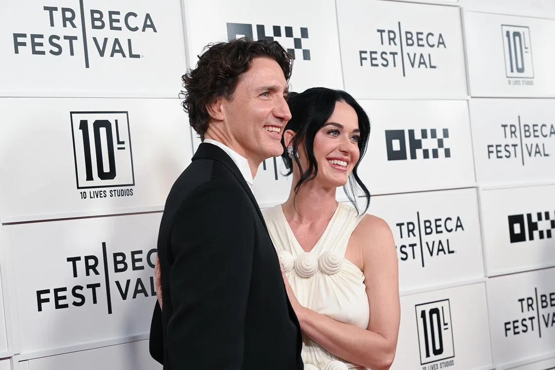 Justin Trudeau and Katy Perry at the Katy Perry: The Lifetimes Tour - Live From Paris' premiere at the 2026 Tribeca Festival, New York.