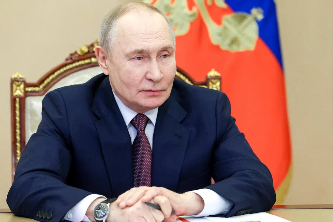 Russia's President Vladimir Putin chairs a meeting with the Security Council's permanent members via a video link in Moscow, Russia, January 21, 2026. Sputnik/Vyacheslav Prokofyev/Pool via REUTERS