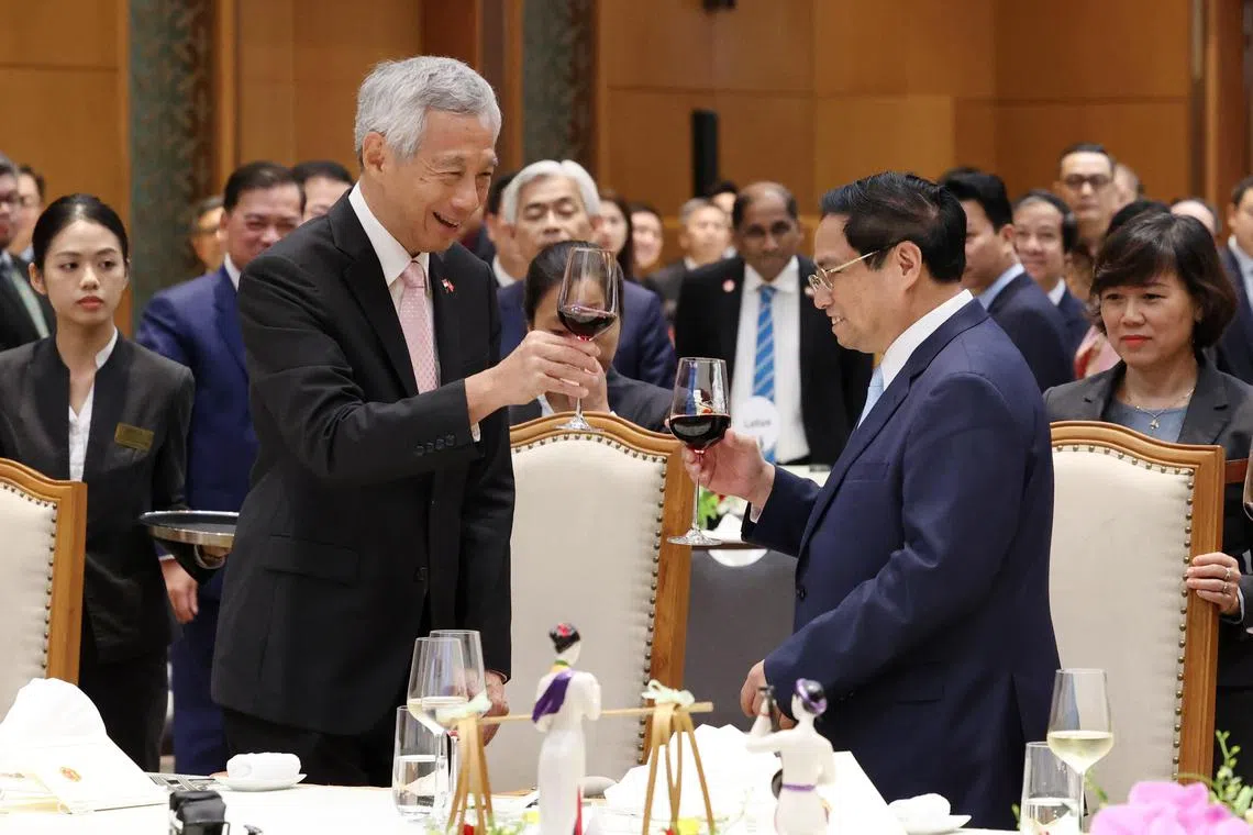 Prime Minister Lee Hsien Loong attends an official dinner hosted by Vietnamese Prime Minister Pham Minh Chinh in Hanoi, on Aug 28.