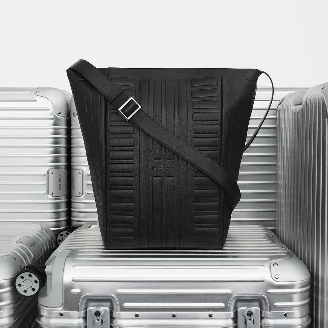 Rimowa's new hobo bag ($2,700) has a relaxed broad top that can fit a 13-inch laptop and an adjustable strap.