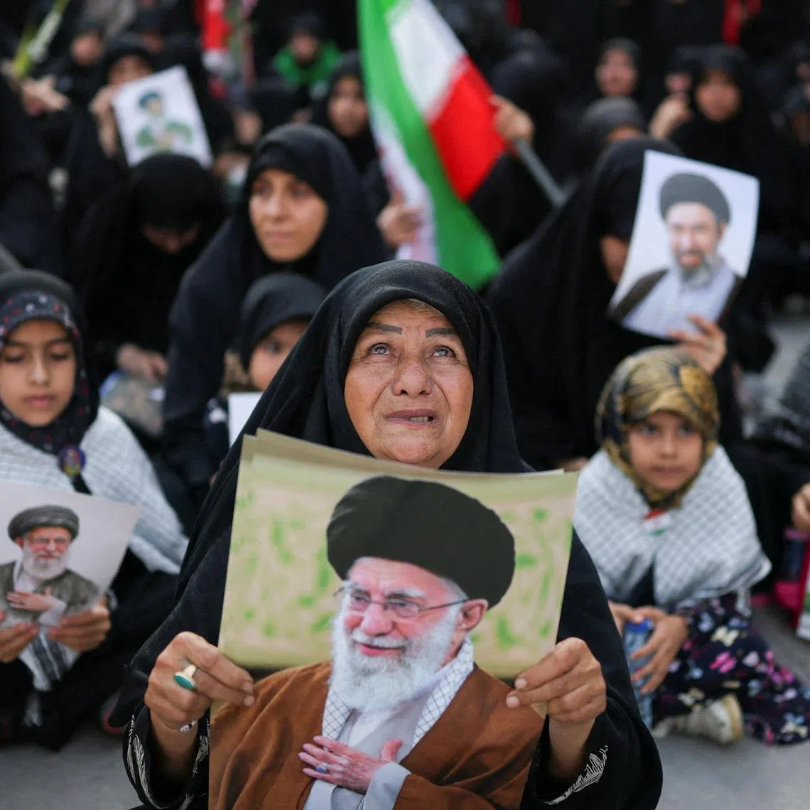 People gather on the day of a public farewell ceremony to pay their respects to late Supreme Leader Ayatollah Ali Khamenei, who was killed on February 28 in Israeli and U.S. airstrikes, at the Imam Khomeini Grand Mosalla, in Tehran, Iran July 4, 2026.  REUTERS/Mohammed Salem
