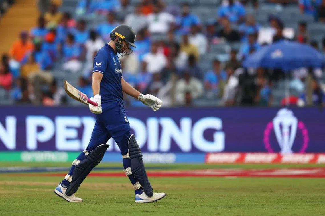 Cricket - ICC Cricket World Cup 2023 - England v Netherlands - Maharashtra Cricket Association Stadium, Pune, India - November 8, 2023 England's Dawid Malan walks after losing his wicket, run out by Netherlands' Logan van Beek REUTERS/Andrew Boyers
