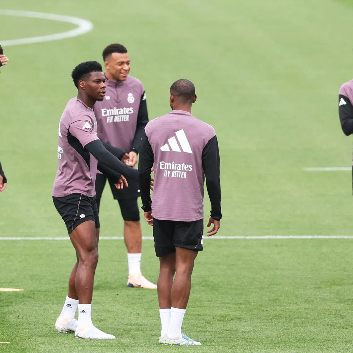 Soccer Football - LaLiga - Real Madrid Training - Ciudad Real Madrid, Valdebebas, Madrid, Spain - May 9, 2026 Real Madrid's Kylian Mbappe, Jude Bellingham, Aurelien Tchouameni and Vinicius Junior during training REUTERS/Isabel Infantes
