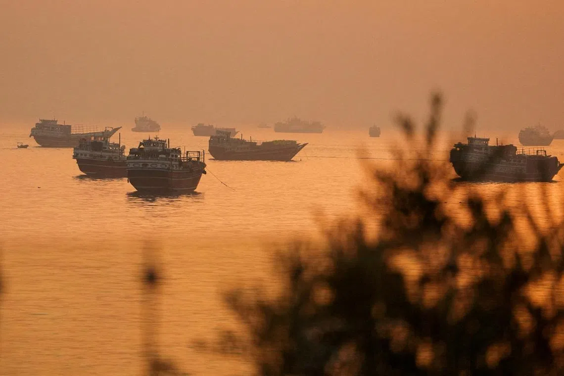 FILE PHOTO: Vessels at the Strait of Hormuz, as seen from Musandam, Oman, June 16, 2026. REUTERS/Stringer/File Photo