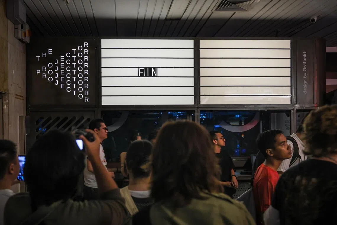 Supporters taking pictures of the cinema the unofficial farewell party for the indie cinema The Projector at Golden Mile Tower on Aug 23, 2025.