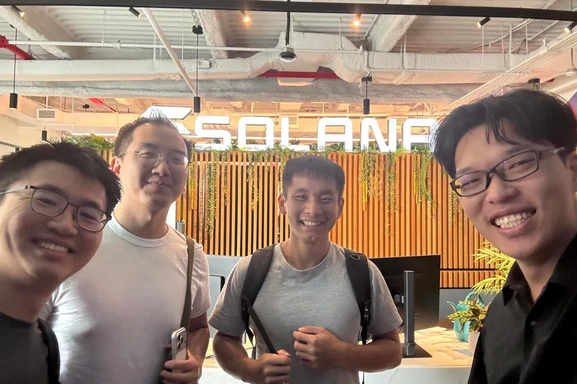 Travis Sim, 24, with colleagues from his internship company Momentum at a co-working space in New York.