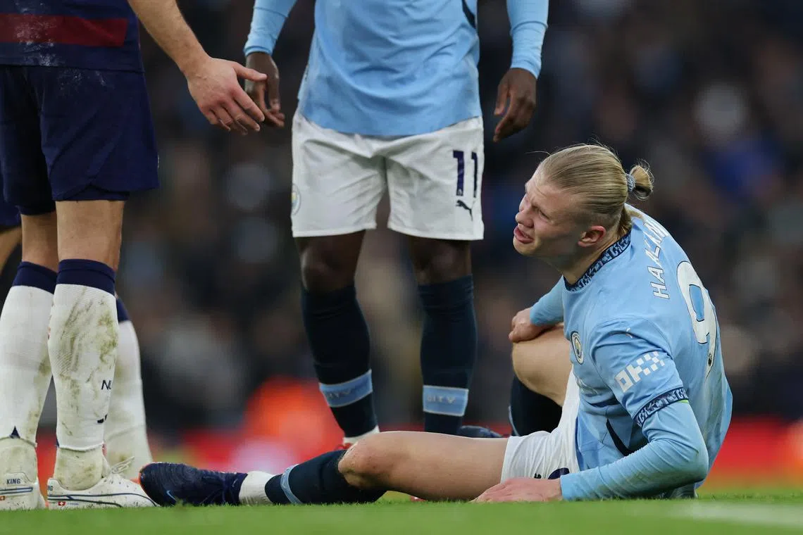 FILE PHOTO: Soccer Football - Premier League - Manchester City v Newcastle United - Etihad Stadium, Manchester, Britain - February 15, 2025 Manchester City's Erling Haaland reacts after sustaining an injury REUTERS/Phil Noble/File Photo