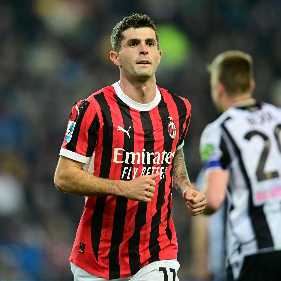 FILE PHOTO: Soccer Football - Serie A - Udinese v AC Milan - Bluenergy Stadium, Udine, Italy - April 11, 2025 AC Milan's Christian Pulisic reacts after missed a chance to score REUTERS/Daniele Mascolo/File Photo