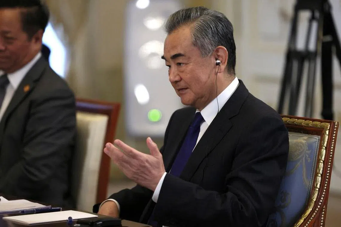 Chinese Foreign Minister Wang Yi attends a meeting with Russian President Vladimir Putin in Saint Petersburg, Russia, September 20, 2023. Sputnik/Mikhail Metzel/Pool via REUTERS/File Photo