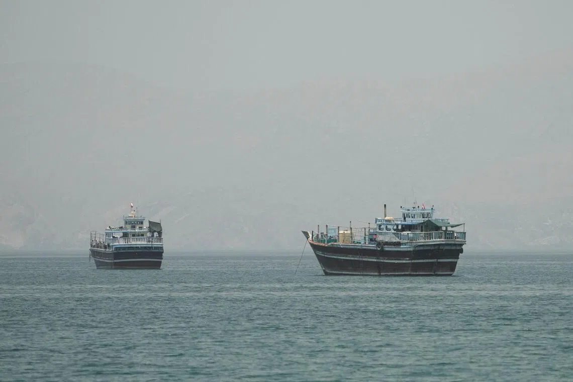 Vessels at the Strait of Hormuz, as seen from Musandam, Oman, on June 24.