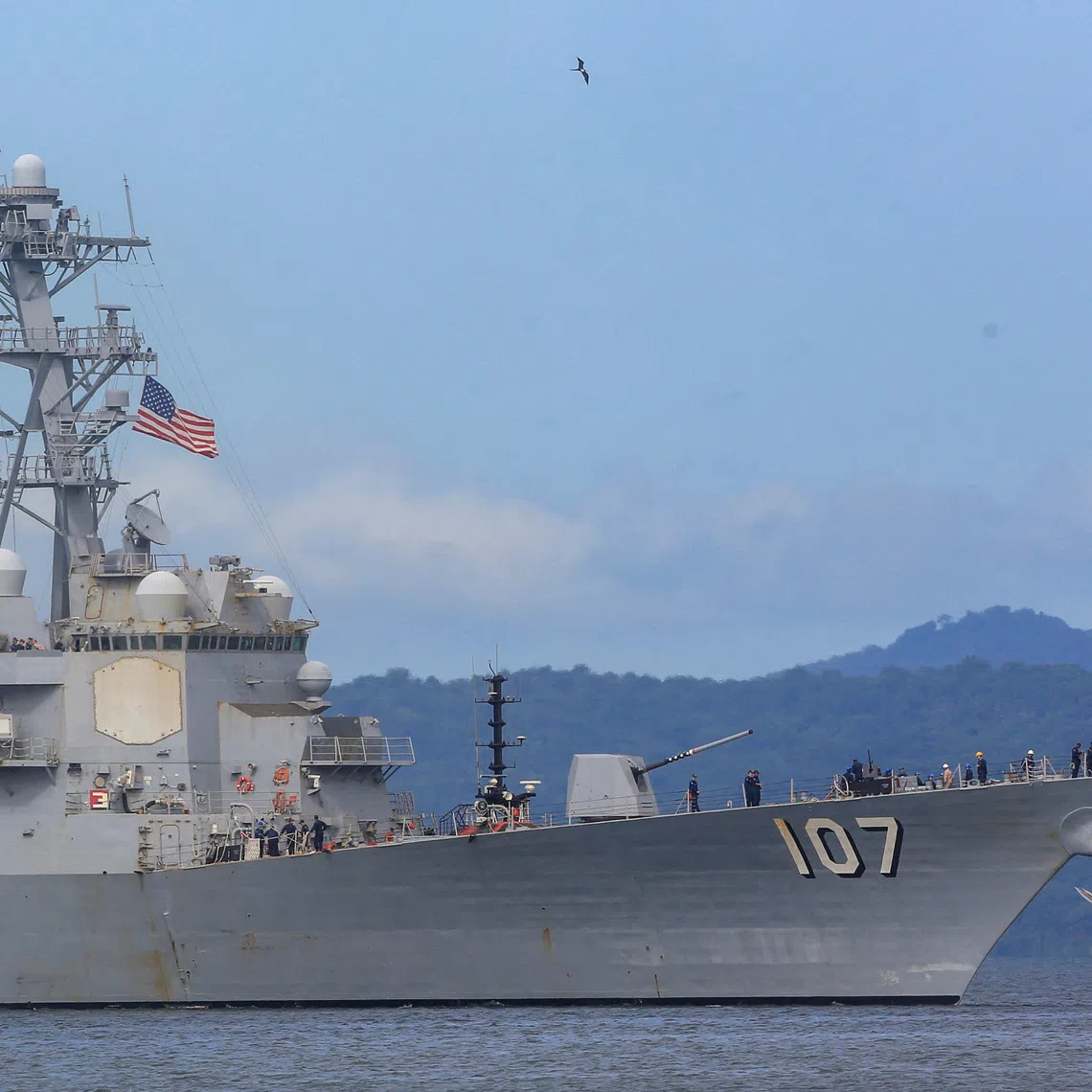 The U.S. Navy destroyer USS Gravely (DDG-107) approaches Port of Spain for joint training with the Trinidad and Tobago Defence Force to strengthen regional security and military cooperation, as seen from Port of Spain, Trinidad and Tobago, October 26, 2025. REUTERS/Andrea De Silva
