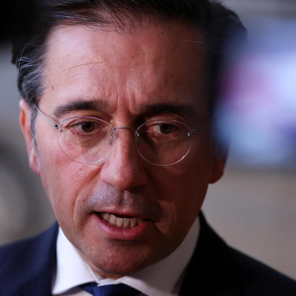 FILE PHOTO: Spanish Foreign Minister Jose Manuel Albares speaks to members of the media as he arrives to attend a European Union Energy and Foreign Affairs ministers meeting in Brussels, Belgium March 16, 2026. REUTERS/Omar Havana/File Photo