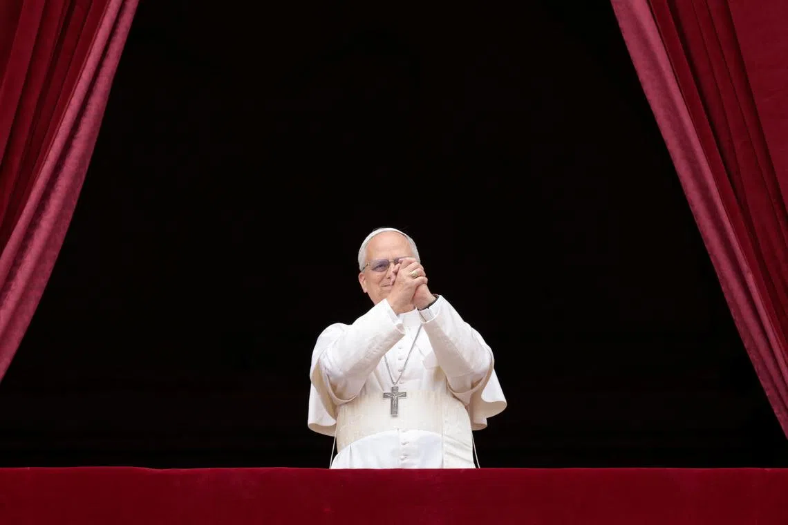 Pope Leo XIV leads a Regina Caeli prayer from the central balcony (Loggia delle Benedizioni) of St. Peter's Basilica, at the Vatican, May 11, 2025. REUTERS/Remo Casilli