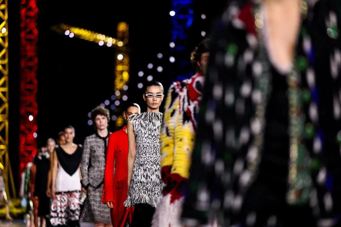 Models present creations by designer Matthieu Blazy as part of his Fall/Winter 2026/2027 Women's ready-to-wear collection show for fashion house Chanel during Paris Fashion Week in Paris, France, March 9, 2026.